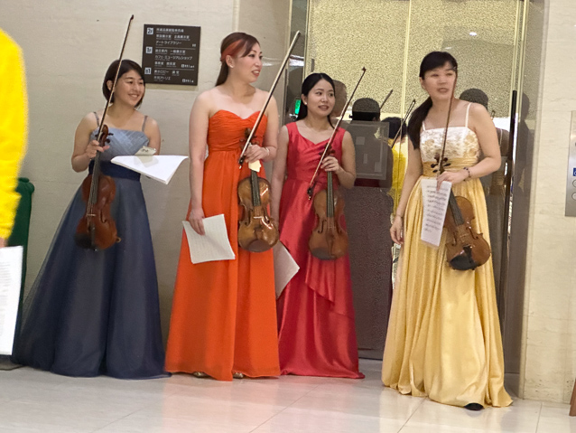 We had lunch in the small museum cafe and heard violin music. In the small lobby they set up a few rows of chairs and these ladies gave a short concert .