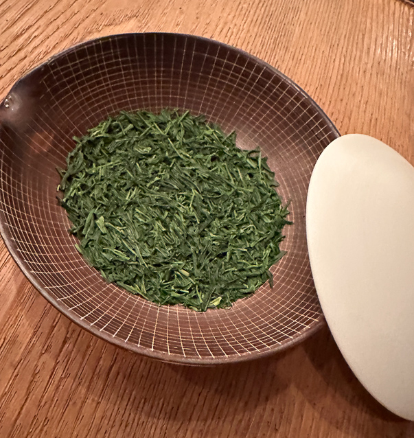 Dry gyokuro tea leaves before the first brewing. Gyokuro is made from specilized cultivars of Camellia sinensis, such as Asahi, Okumidori, Yamakai, and Saemidori. It also is grown in shade.