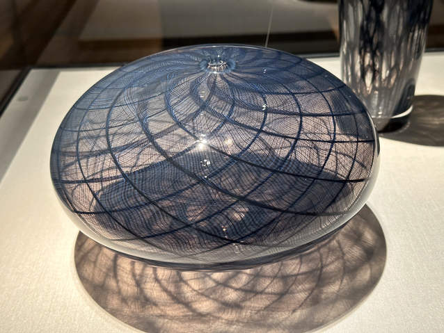 A piece of fIligree glass.