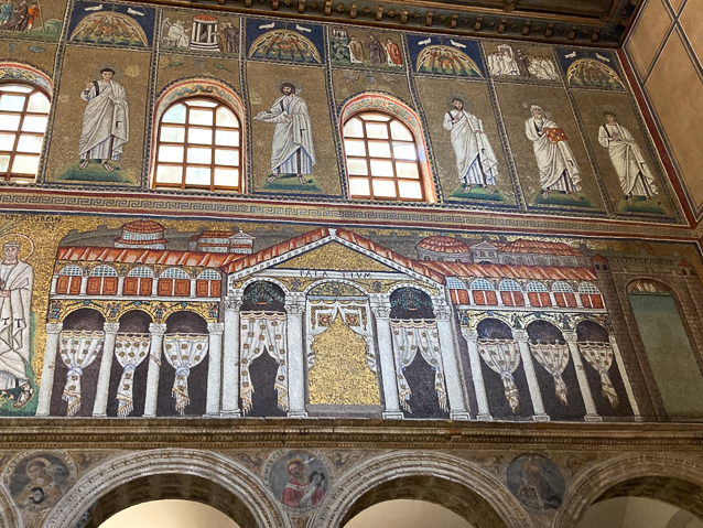 All that remains of the Arian followers of Theodoric's coirt are four hands appearing in front of colums 1, 3, 5, and 11.