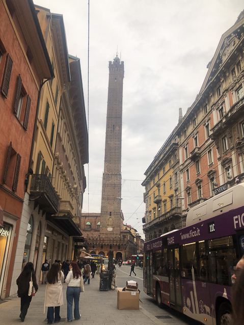 The incredibly tall, slender Asinelli tower is one of two at the end of Via Rizzoli.