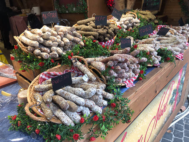 A nearby street market displayinged sausages.