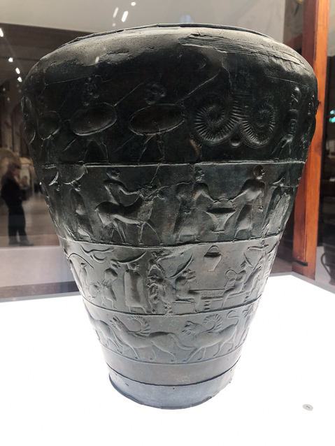 The Certosa Situla, bronze, end of 7c to beginning of 6c. The decoration is in four bands, of which the first three are a procession of warriors and women which can be interpreted either as a celebration of the return of a victorious military expedition or as a funeral parade leading up to the central figure of two men on a couch in a musical competition. Its original function was as a situla, a vessel for libations, but it ended up a century later than its manufacture as grave goods as an heirloom of the family.