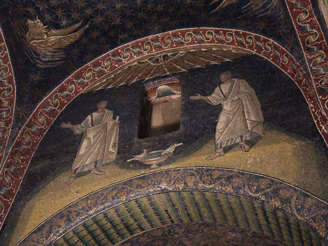 An alabaster winddow in the twoer  between two apostles.