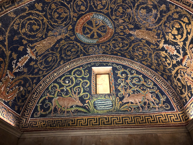 The walls are stone, and mosaics cover the lunettes and vaults.