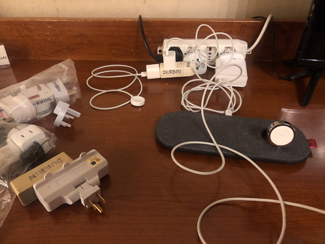 Traveling with digital cameras, phones, and watches involves many adapters and much wire.