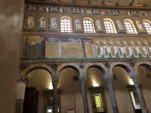 The procession on the north wall starts in the city of Classe, which was a naval port.