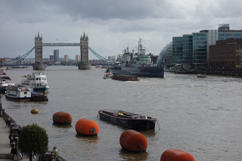 The view downstream includes Tower Bridge and HMS Belfast, which is permanently anchored there.