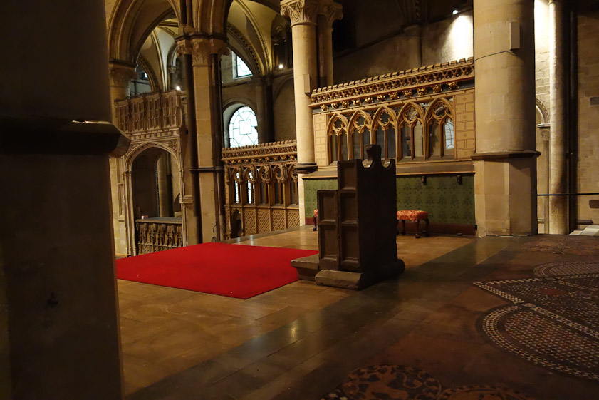 The bishop's throne, with the candle out of the picture to the right.
