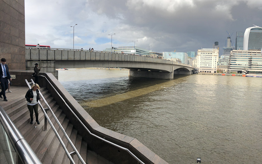The part of the cantilever beam attached to the bank is called the anchor arm and the part extending into the space between the piers is the cantilever arm.