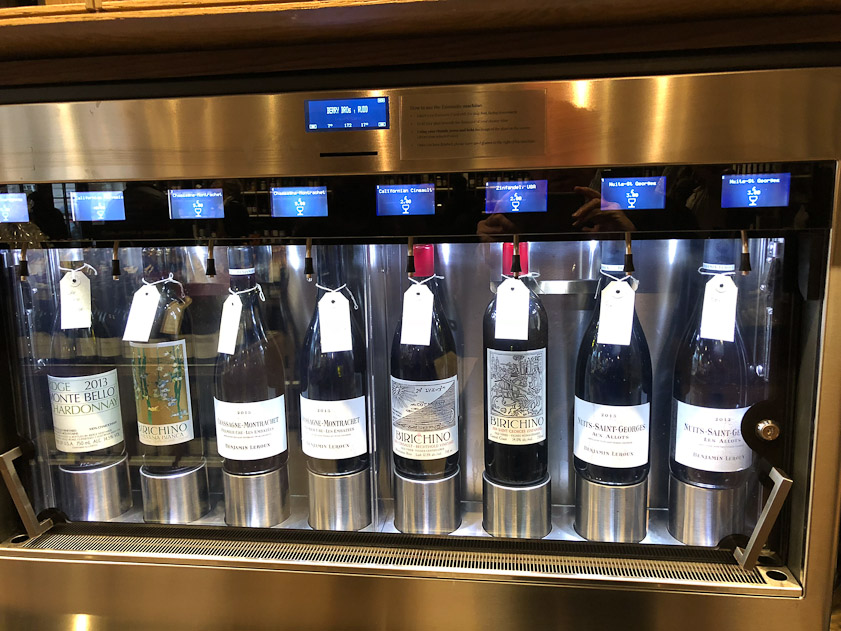Some wines can be tasted, for a price. Presumably these bottles are backfilled with nitrogen to prevent oxidation.