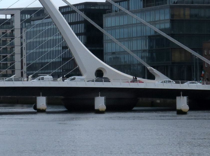 This closeup shows that each back stay consists of three cables. The whole bridge is balanced on, and rotates about, the black pile dimly visible under the hole in the mast.