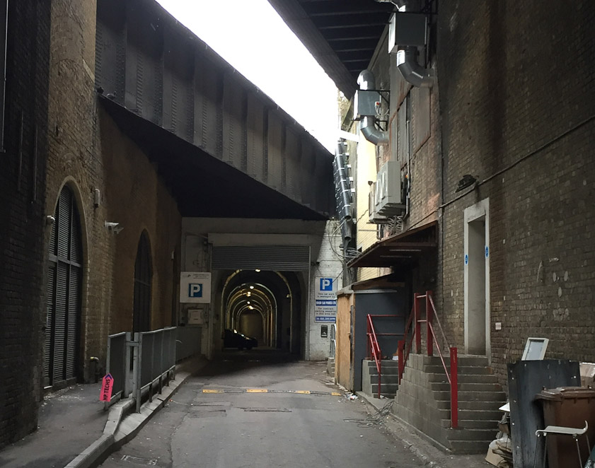 At the end of the spectrum of development is the parking lot found by Janette. It was in a warren of barrel vaults supporting rail lines converging on Blackfriars Railroad Bridge. This is the entrance.