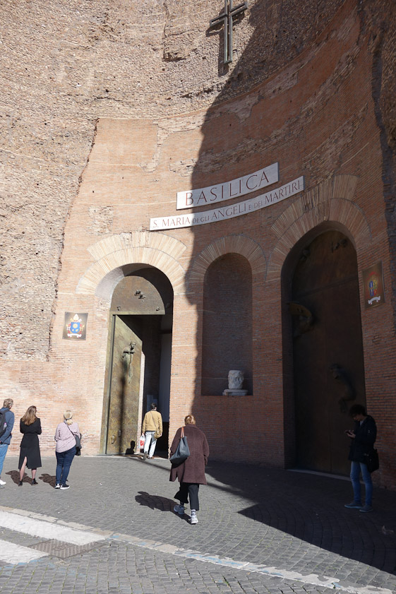 In the 1560s, Pope Pius IV commissioned Michelangelo to convert  some of the remaining parts of the Baths into the basilica Santa Maria degli Angeli e dei Martiri. Michelangelo made use of both the frigidarium and tepidarium structures.