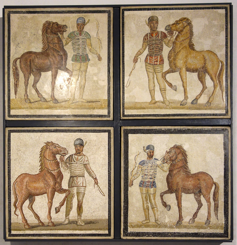 Another pavement from Villa Baccano, showing four charioteers from the four circus factions: green for the prasina, red for the russata, white for the albata, and blue for the veneta.
