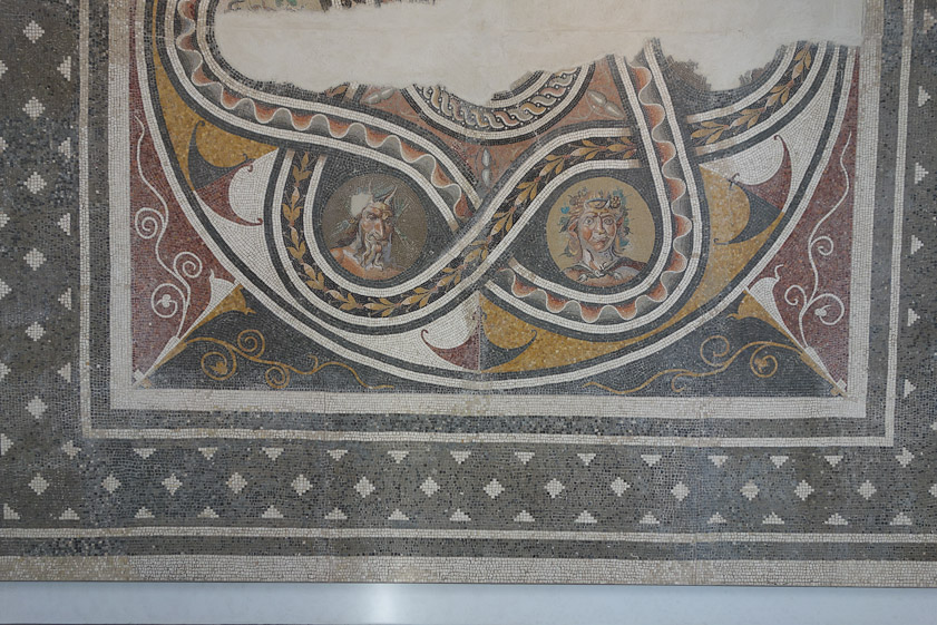 Mosaic from 138-192 AD with the heads of a Satyr and of Pan.