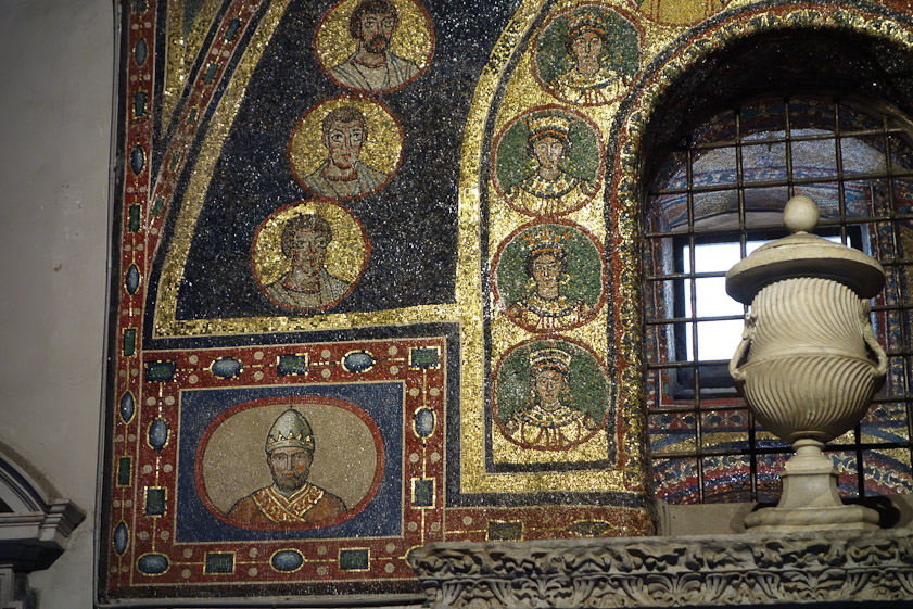 At the bottom are two portaits of Popes.