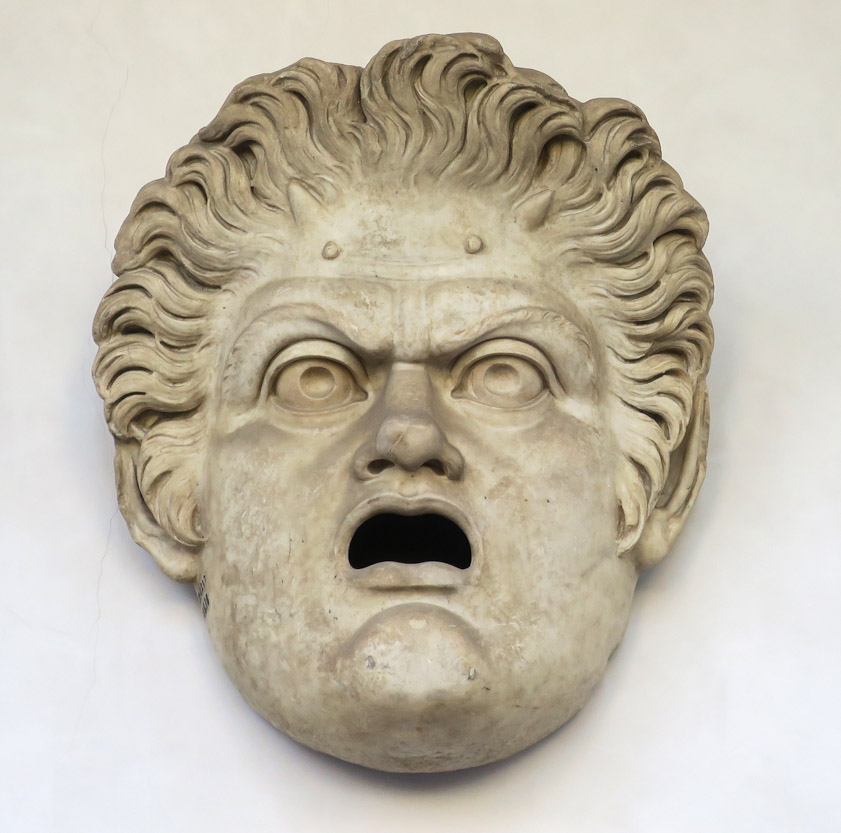 The four cloister corridors, each  80 m long, are the display area for various artifacts found around Rome such as this face, perhaps a fountain mouth.