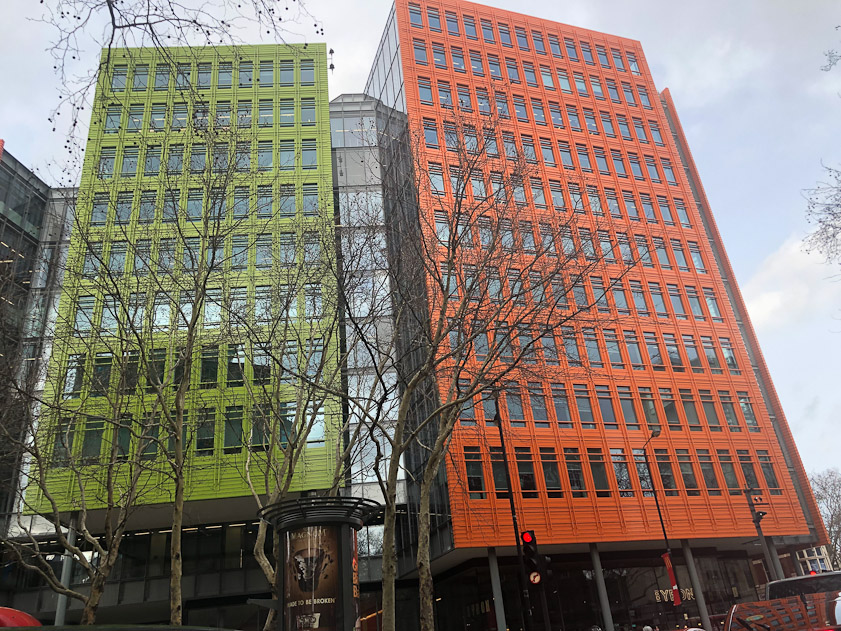 Two brightly colored buildings where High Holburn crosses Shaftsbury. Google London occupies the red building.