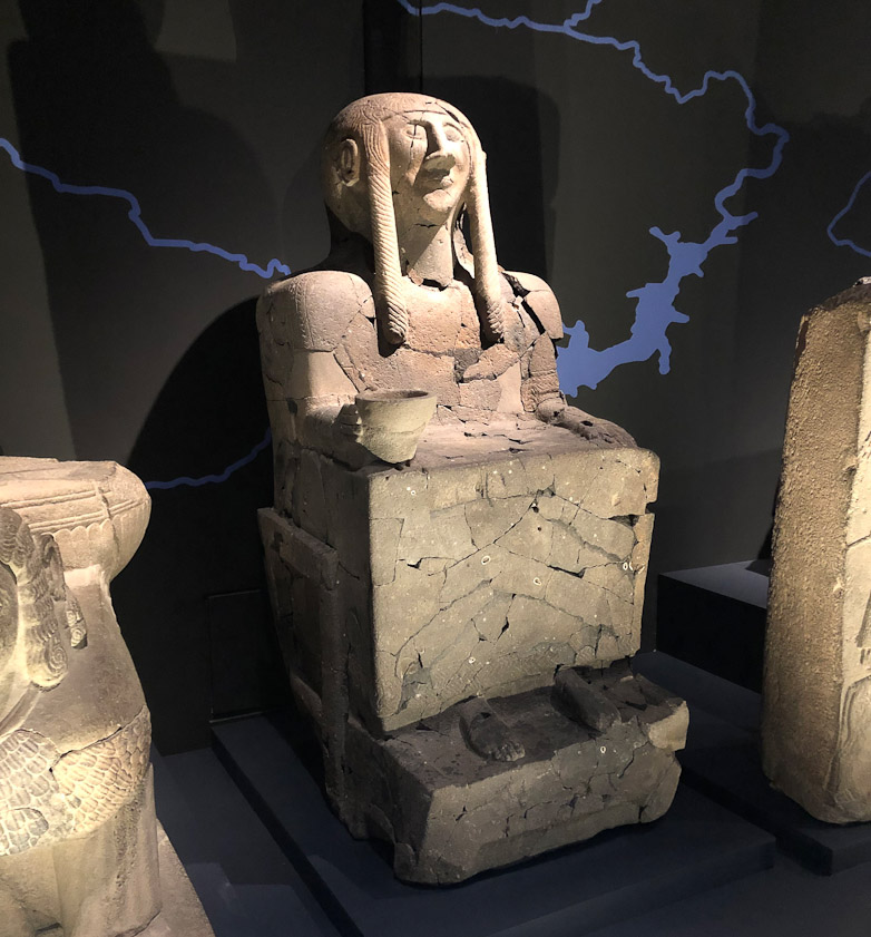 This basalt funerary monument to a woman was found at Tell Halaf, Syria in 1912. It was damaged by an Allied bomb in 1943 that destroyed the Tell Halaf Museum in Berlin. It was extensively restored.
