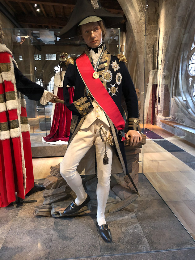This is the effigy of Admiral Horatio Nelson, purchased by the Abbey to compete with St. Paul's Cathedral, where Nelson's funeral and tomb were located.