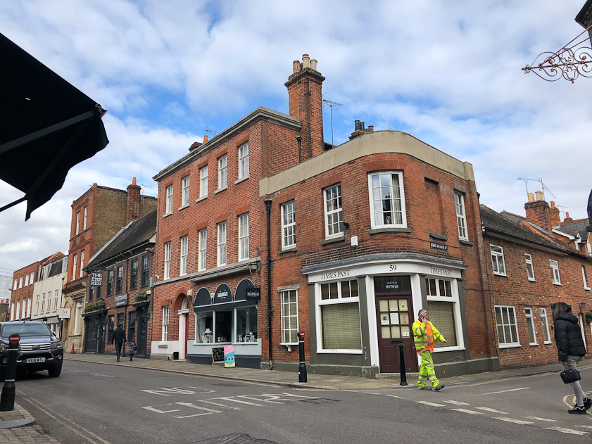 The shops diagonally across from Gilbey's.