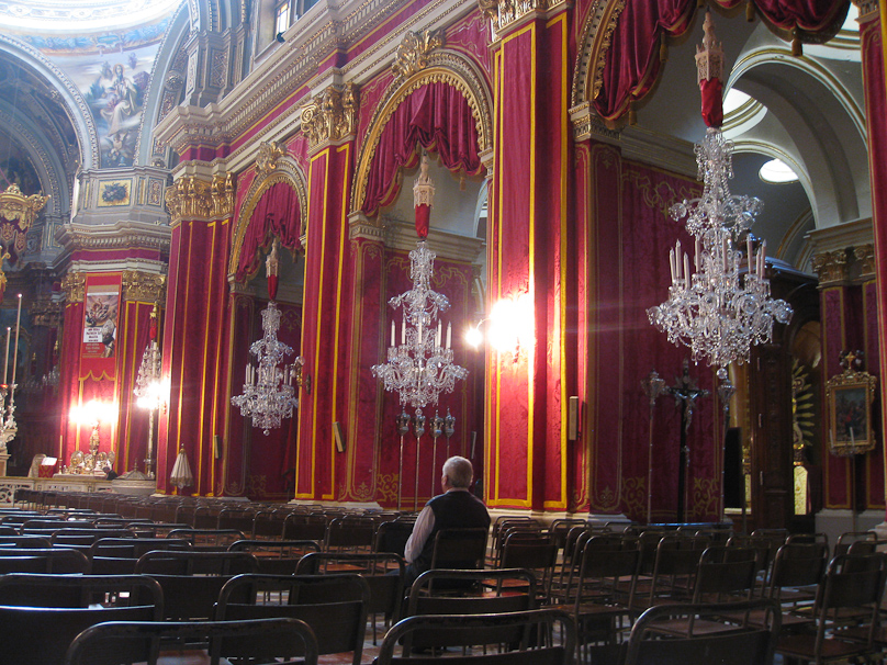 The interior of St. Publius in Floriana is covered in red silk.