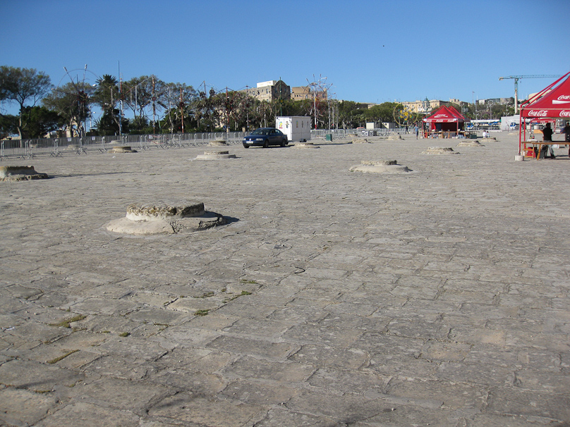 The court in front of St. Publius church in Floriana covers a large set of granaries.