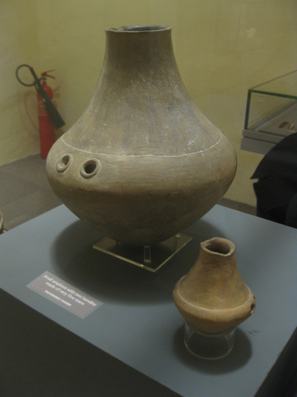 Two pots from Tarxien Temple that are interesting for their shape and for their having holes for handles.