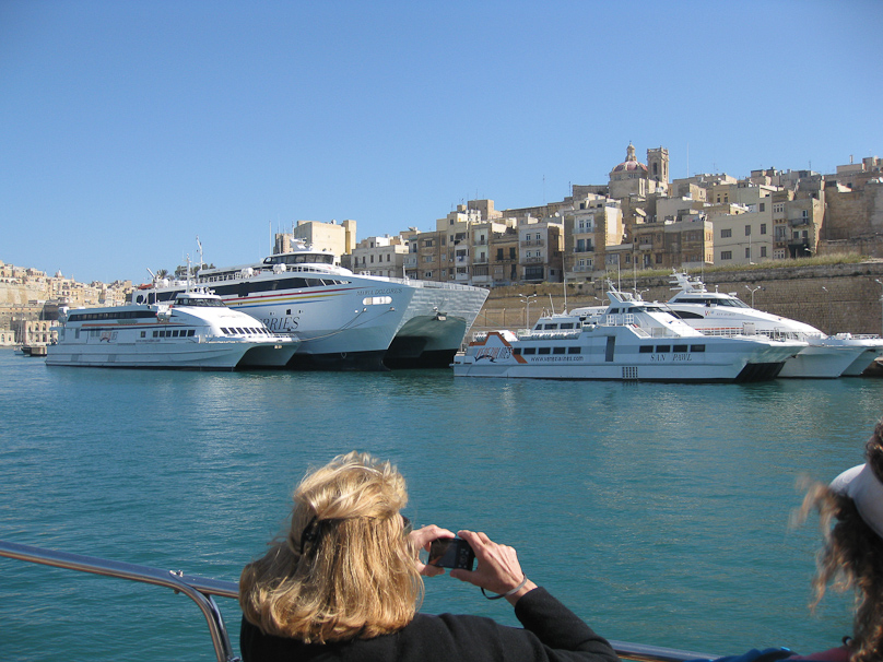 These catamarans are ferries. The big one brought refugees out of North Africa during a recent revolution.