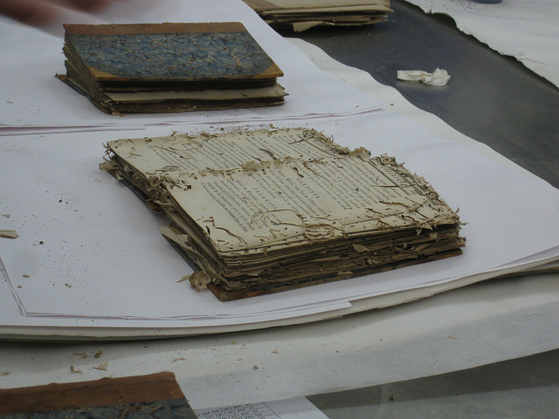 Ruinous book eaten by insects before conservation.