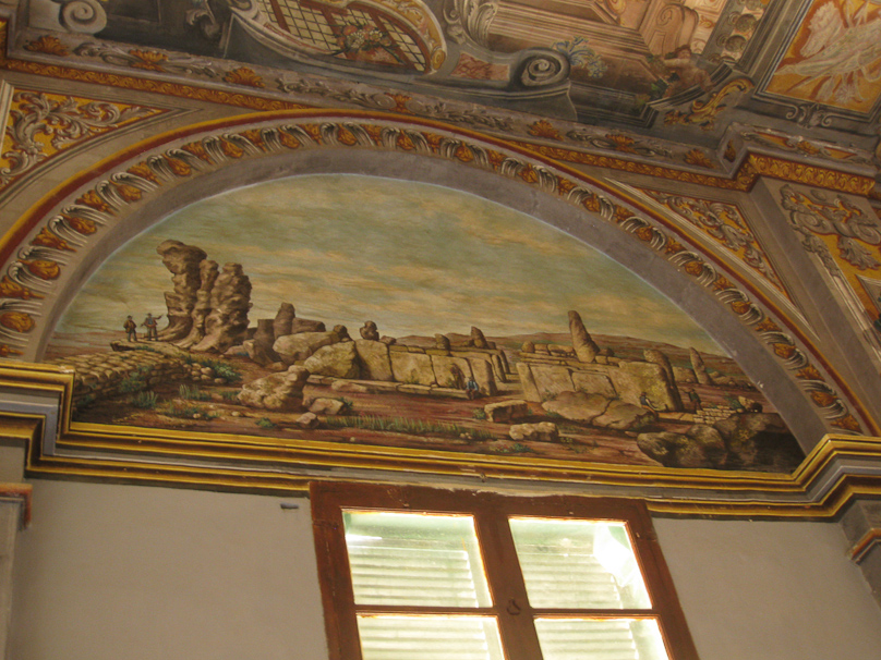 This appears to be a painting of the Neolithic monument at Hagar Qim.