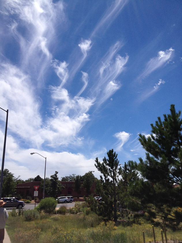 Clouds over Museum Hill in Santa Fe.