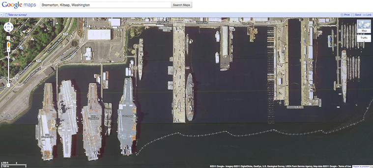 Using Google Maps later, we found the carriers were, from left to right, the Independence (commissioned 1962), Kitty Hawk (1963), Constellation (1961), and Ranger (1957). All have been retired.