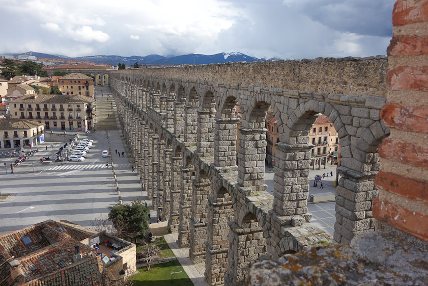 A view from inside the city. The water was carried in an open channel on  top of the second row of arches. In the distance you can see where the aqueduct makes a sharp turn.