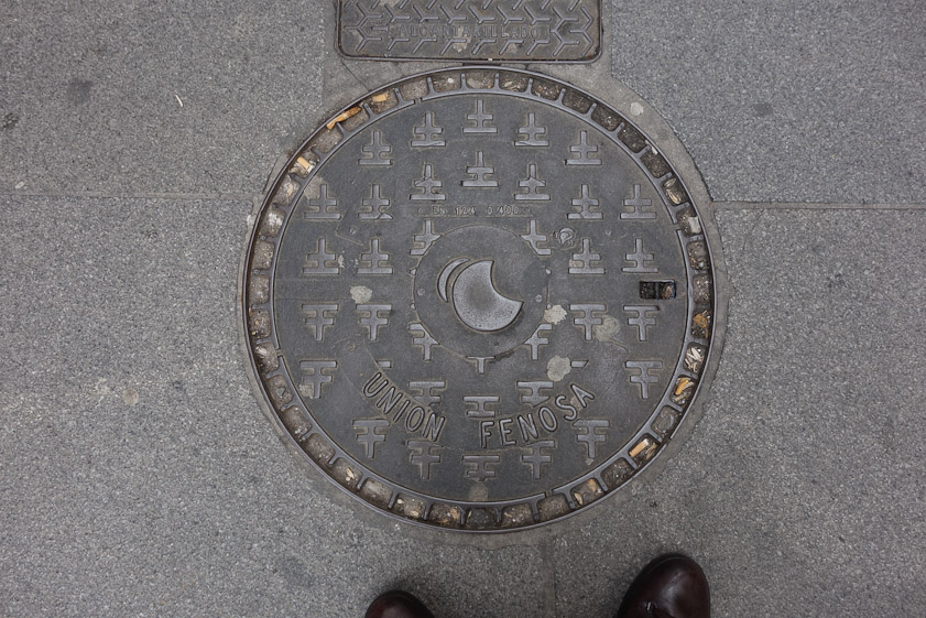 Manhole cover in Segovia. Union Fenosa was a gas company, subsequently acquired by Gas Natural.