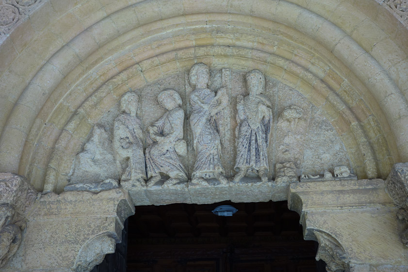 Scenes from the Bible in the typanum over the south door.