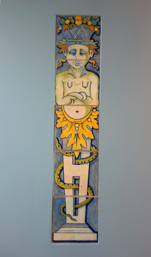 Another amusing ceramic work of 1565 from Talavera. A cross-eyed Herm with droopy little breasts being tempted by a snake.