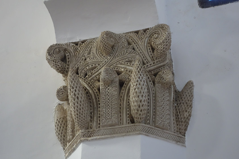 The capitals are beautifully detailed stone carving.