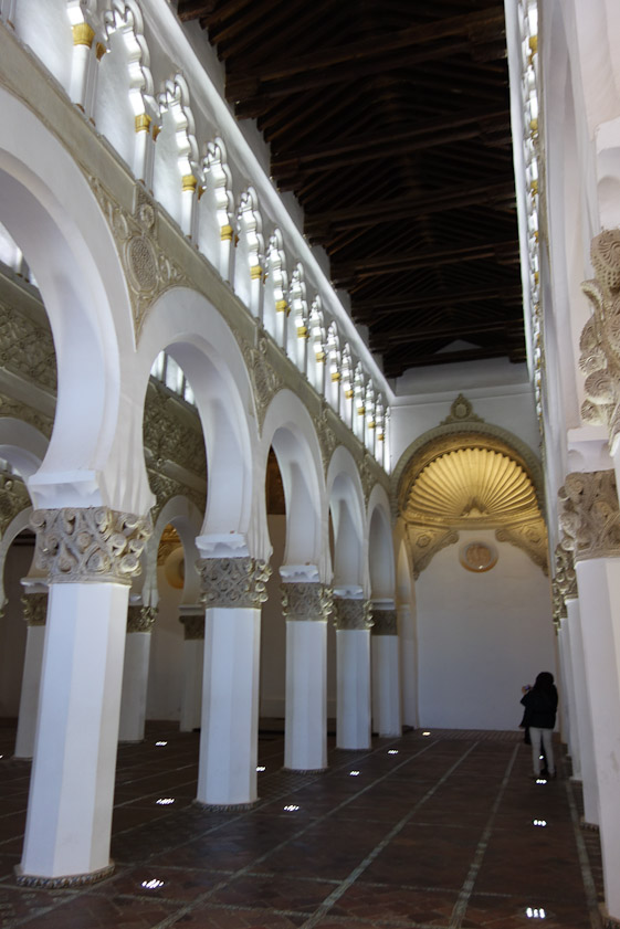 The aisle ends in a small apse.