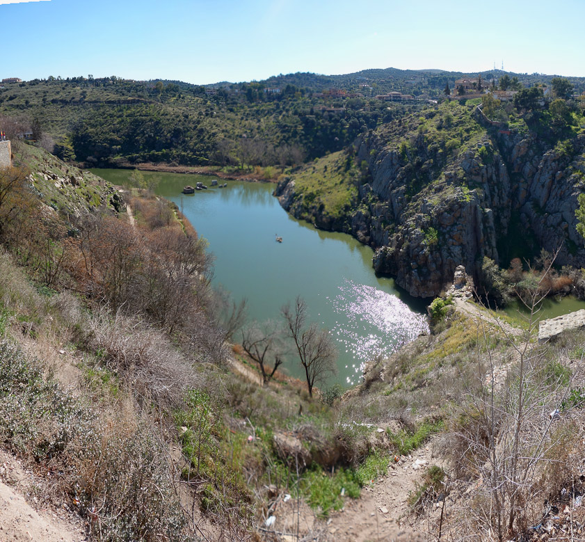 San Juan de los Reyes and Santa Maria la Blanca are close to the southwest wall of Toledo, with the Tagus circling in a deep valley below.