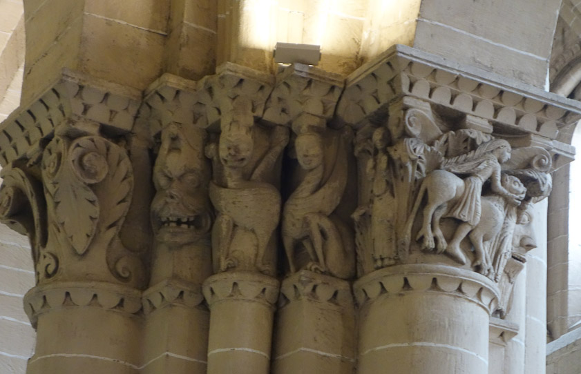 Capital in Salamanca Old Cathedral. The most remarkable feature is the girl with the flowing hair riding the cat at the right.