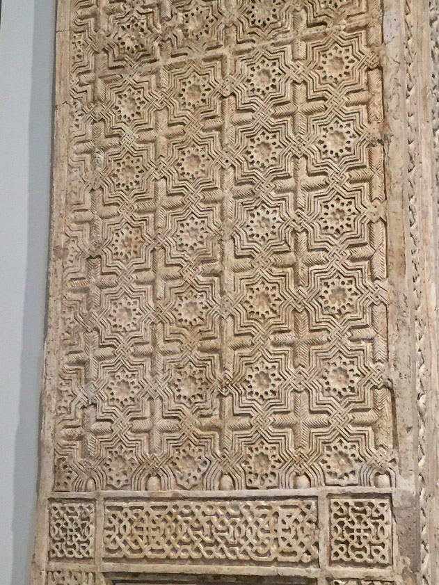 Fine Islamic stone carving on a doorway from Al-Andalus.