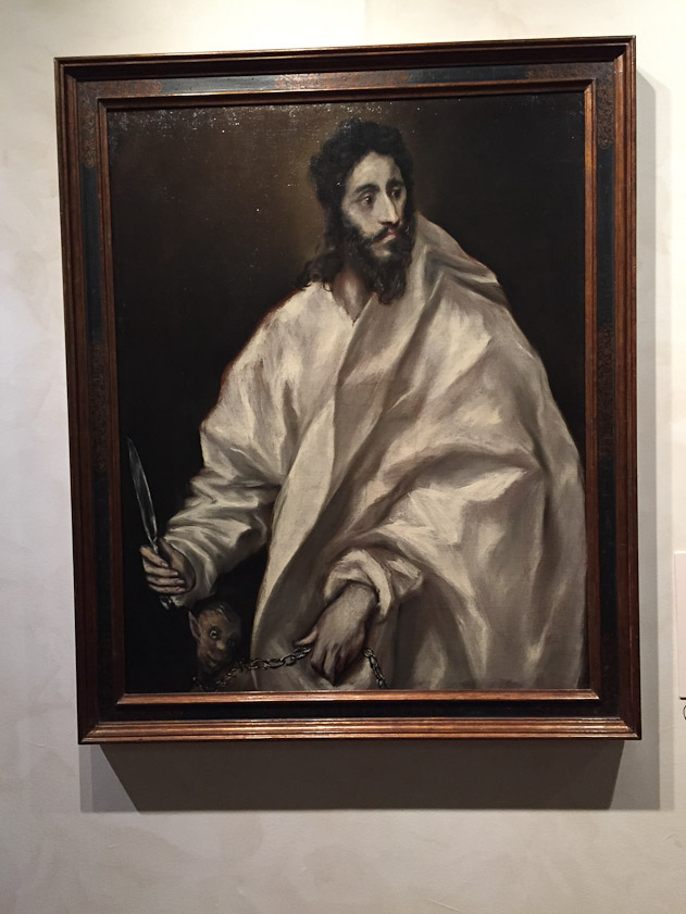 San Bartolomé holds his attribute, the flaying knife used to martyr him. The devil in chains at bottom left was unable to tempt the saint.