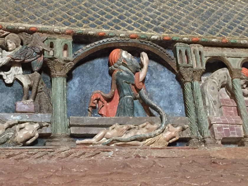 A serpent sent by God to protect the bodies holds a Jew, who prays to God for deliverance if he will build a tomb for the martyrs.. In the last panel on the right he builds the tomb.