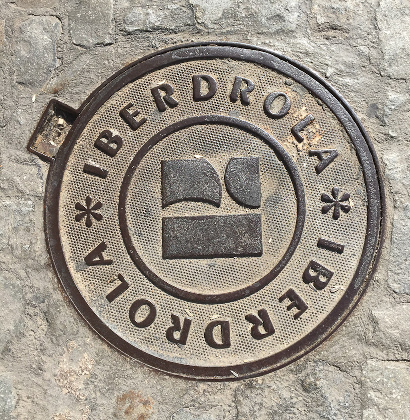 Manhole cover in Avila. Iberdrola is a utilities company.