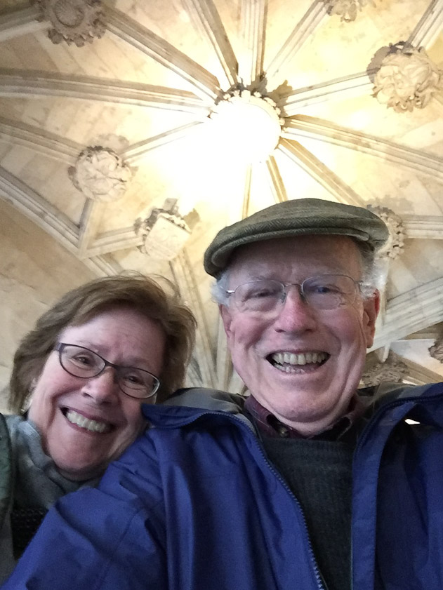 Selfie in a mirror installed to view the vault in the entrance to the Colleges of the University of Salamanca.