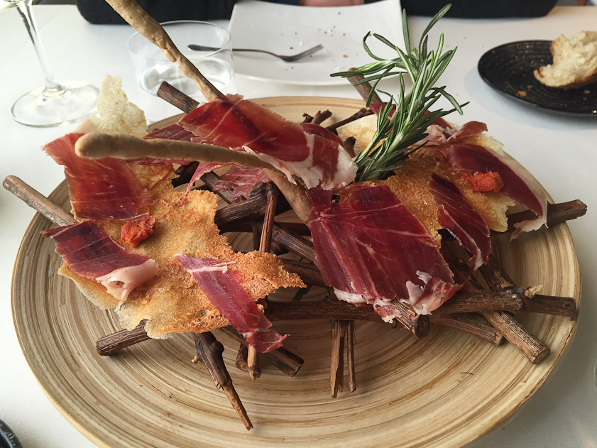 There's a couple of breadsticks here, Iberian ham, some crispy 