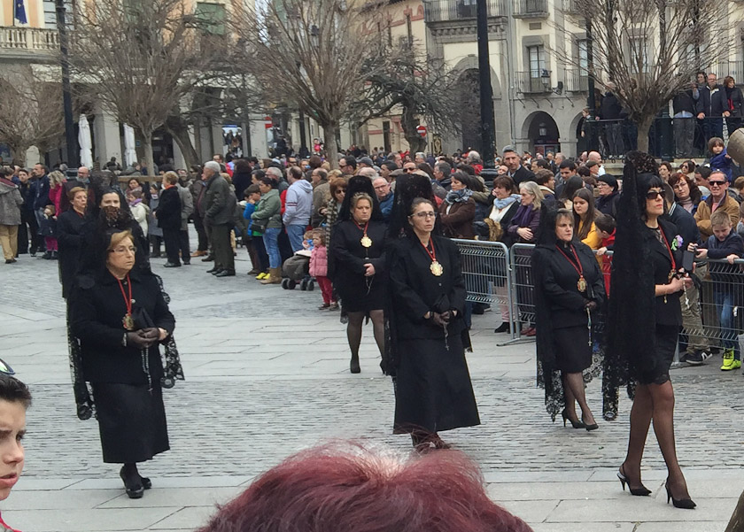 Elegant ladies in black end the processions, with hemlines and heels higher or lower.
