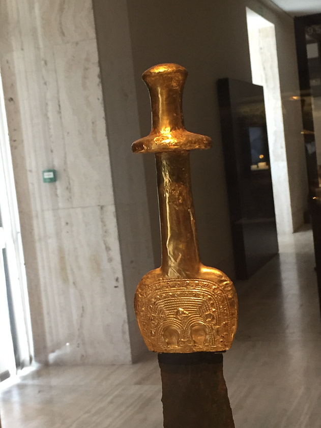 Mid-10c BC gold-copper sword hilt from Guadalajara.
